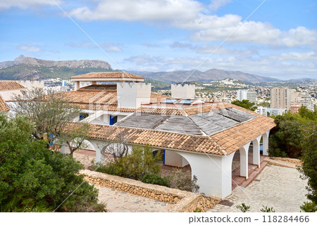 Breathtaking Aerial View Calpe Spain Mediterranean Coastline Penon de Ifach Rock Lush Vegetation Sunny Day Tourism Paradise, Panoramic Vista Calpe Costa Blanca Turquoise Waters Golden Beaches Iconic 118284466