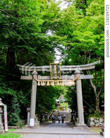 Stone torii gate on the east approach to Shiogama Shrine (vertical) Stone torii gate on the east approach to Shiogama Shrine (vertical) 118284725