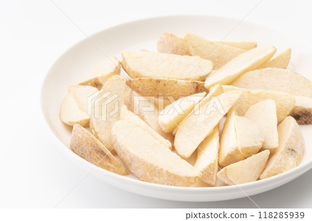 Close-up of frozen french fries with skins 118285939