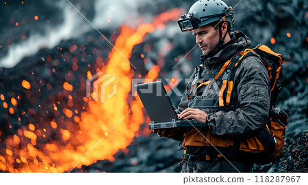 Volcanologist analyzing data near erupting volcano 118287967