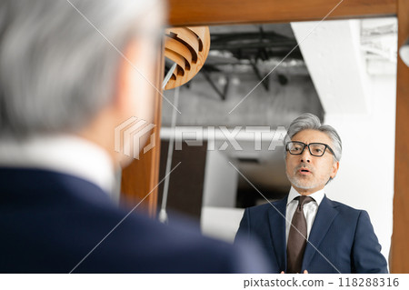 Businessman who makes dressing Businessman who makes dressing 118288316