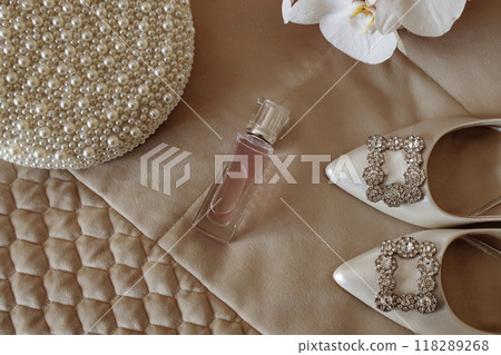 Bride's wedding accessories. Beige colors. 118289268