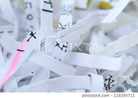 Close-up of documents being shredded 118293711