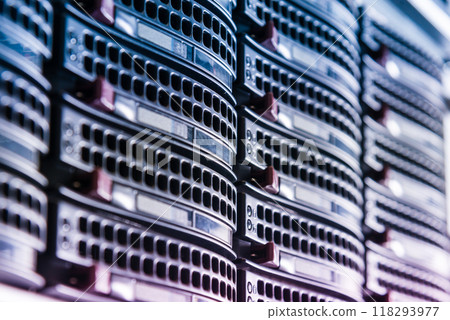 Cluster of data storage hard drives inside server room 118293977