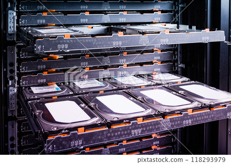 Cluster of hard drives inside open tray Cluster of hard drives inside open tray 118293979