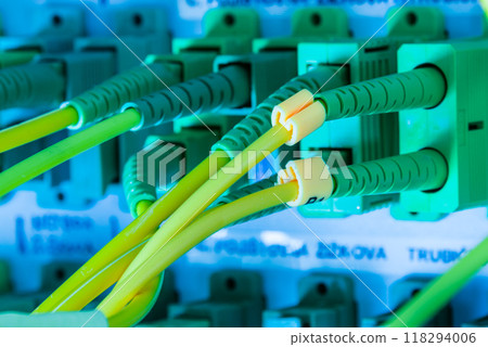 fiber optic cables connected into main data switch fiber optic cables connected into main data switch 118294006