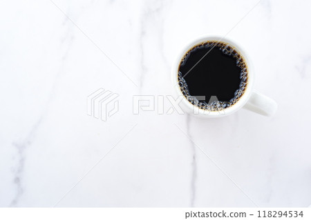 A top-down view of a mug of freshly brewed coffee A top-down view of a mug of freshly brewed coffee 118294534