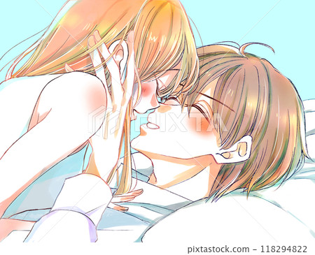 Male and female couple playing in bed, smiling, holding hands 118294822