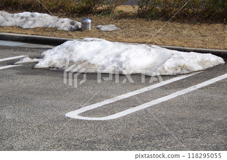 Snow remaining in parking lots at public facilities 118295055
