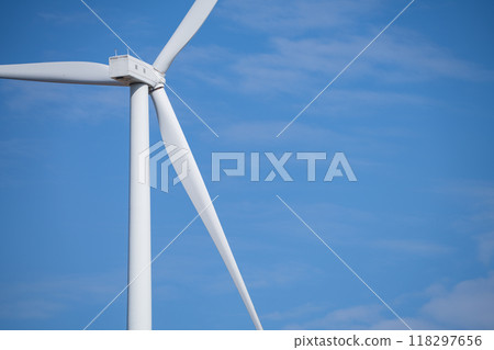 Wind turbines against blue sky, Wind energy. Wind power. Sustainable, renewable energy. Wind turbine generate electricity. Sustainable resources. Green technology for energy sustainability. 118297656