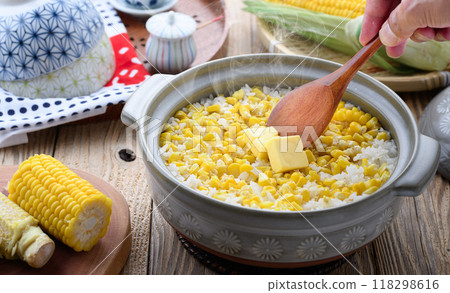 Corn rice cooked in a clay pot Corn rice cooked in a clay pot 118298616
