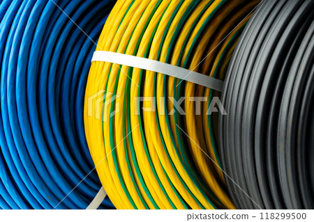 Three Rolls of Electrical Wire in Blue, Yellow and Green, and Black Colors Three Rolls of Electrical Wire in Blue, Yellow and Green, and Black Colors 118299500
