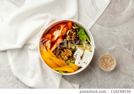 Tasty poke bowls on gray textured surface Tasty poke bowls on gray textured surface 118299530