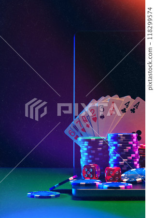 Laptop With Playing Cards and Poker Chips on a Green Table 118299574