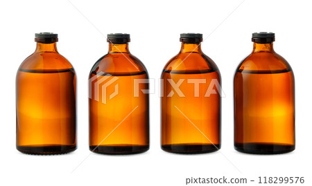 Four Amber Glass Bottles With Black Caps on a White Background 118299576