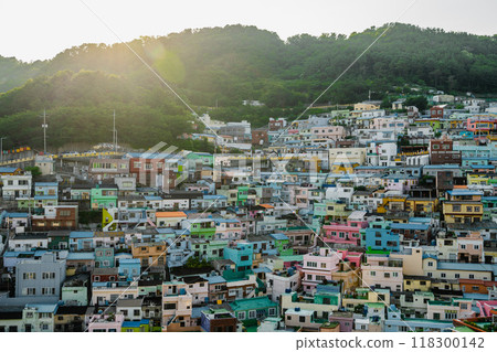Colorful hillside homes of Busan basking in warm sunlight during a serene late afternoon Colorful hillside homes of Busan basking in warm sunlight during a serene late afternoon 118300142