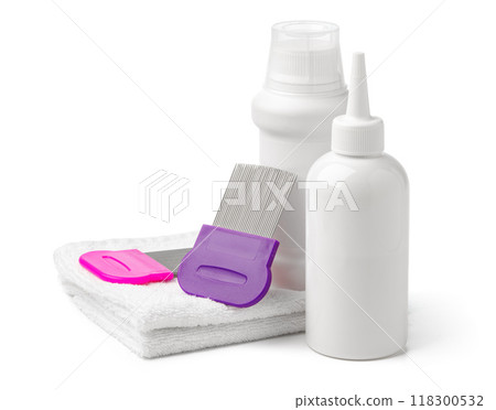 Comb, anti lice medicine and towel on white background Comb, anti lice medicine and towel on white background 118300532