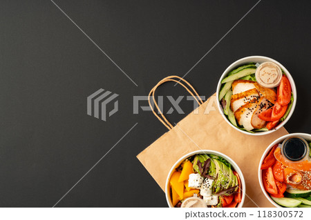 Side view of fresh poke bowls on black background 118300572