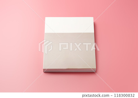 A Collection of Blank Papers Stacked on a Pink Surface for Creative Projects 118300832