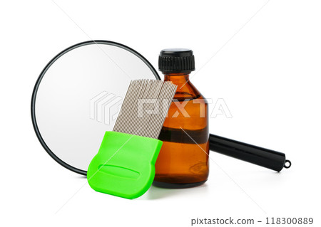 Cosmetic products, lice comb and magnifying glass isolated on white Cosmetic products, lice comb and magnifying glass isolated on white 118300889