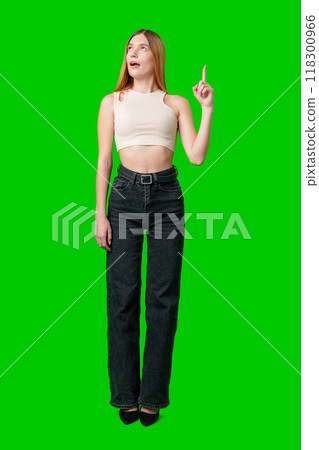 Young Woman With Long Hair Pointing To Copy Space Young Woman With Long Hair Pointing To Copy Space 118300966