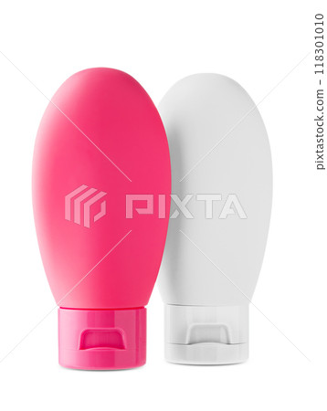 Travel-sized squeeze bottle for toiletries displayed against a plain background Travel-sized squeeze bottle for toiletries displayed against a plain background 118301010