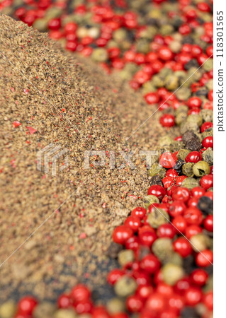Ground pepper, a mixture of red, green, white and black pepper. 118301565