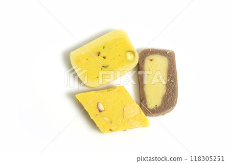 Various Indian sweets during a festive event on a white surface. Top view 118305251