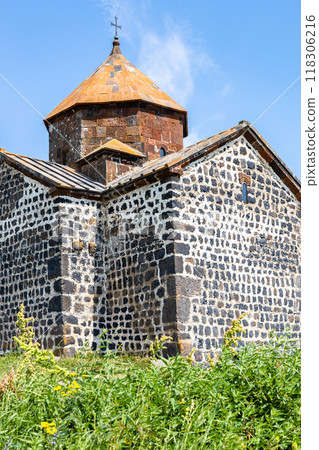 black tuff stone walls of church in Sevanavank 118306216