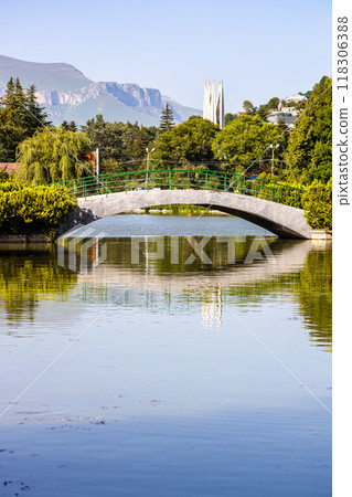 view of pedestrian bridge on lake in Dilijan city view of pedestrian bridge on lake in Dilijan city 118306388