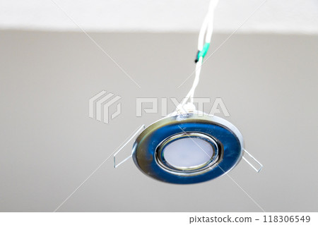 repairing built-in ceiling light in room repairing built-in ceiling light in room 118306549