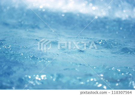 Blue water glitter bokeh background 118307564