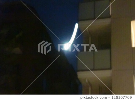 Street lights shining in the city at night Street lights shining in the city at night 118307709