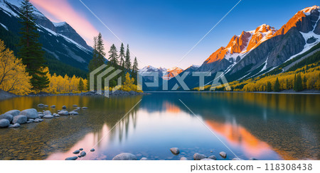 The crystal clear lake reflects the mountains and sky in the evening. 118308438