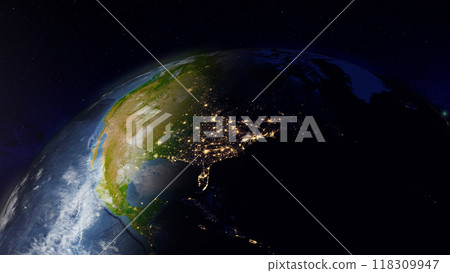 The vast expanse of North America is displayed from space, showcasing vibrant city lights along the eastern coastline against darkened landmasses and the beautiful curvature of the Earth. 118309947
