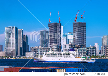 Tokyo cityscape in Japan - View of tower apartments in Harumi, Tokyo, and the Ogasawara Maru 118310381