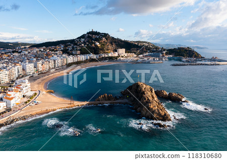 Drone view of Blanes overlooking Sa Palomera Rock and San Juan castle hill Drone view of Blanes overlooking Sa Palomera Rock and San Juan castle hill 118310680