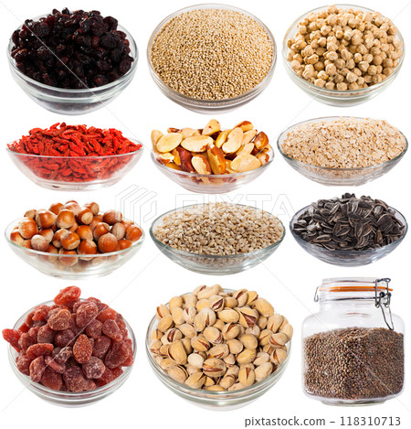 Glass plates with dried and bulk products on white background 118310713