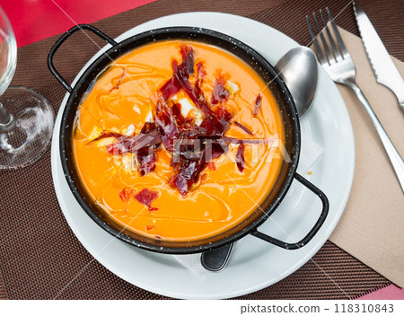 Cordoban salmorejo with ham and egg shavings Cordoban salmorejo with ham and egg shavings 118310843