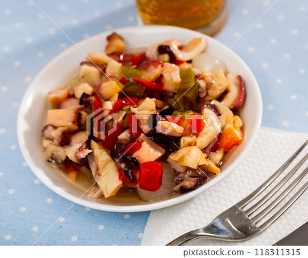 Popular Spanish Salpicon from vegetables and seafood mix 118311315