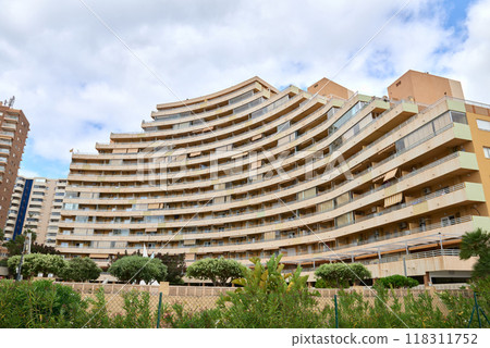 Exclusive Beachfront Hotel Property Towering Palm Trees Intense Summer Heat Spanish Coast Luxury Vacation Spot No Logos Exclusive Beachfront Hotel Property Towering Palm Trees Intense Summer Heat Spanish Coast Luxury Vacation Spot No Logos 118311752
