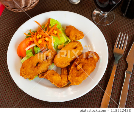National dish of Spanish cuisine is Calamares a la romana National dish of Spanish cuisine is Calamares a la romana 118312428