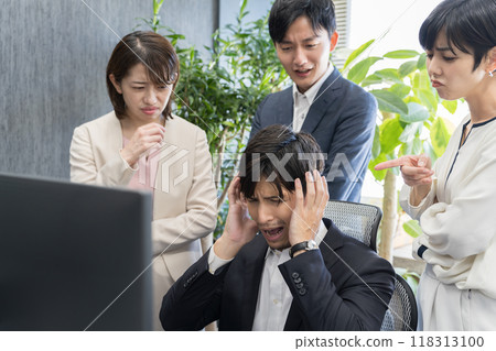 Businessman being cornered 118313100