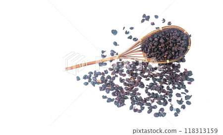 Isolated dark, dried coffee bean husks in bamboo basket and on a white background, highlighting the rough texture and deep color, suitable for themes related to coffee production and processing. Isolated dark, dried coffee bean husks in bamboo basket and on a white background, highlighting the rough texture and deep color, suitable for themes related to coffee production and processing. 118313159