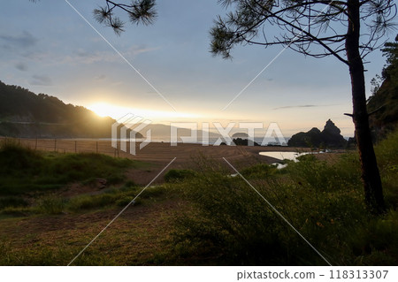 Sunset Breaking Through Clouds at Laga Beach, Basque Country Sunset Breaking Through Clouds at Laga Beach, Basque Country 118313307