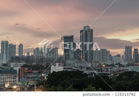 Gorgeous scenic of sunset with beautiful cloud and sky over metropolitan city. 118313792