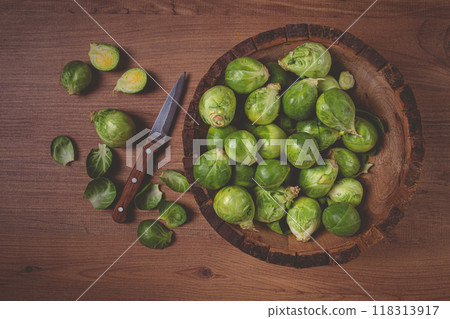 fresh Brussels sprouts, raw, top view, on a wooden table, no people, 118313917