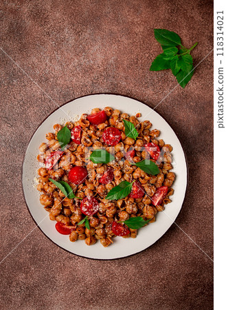 Tuscan pasta with smoked paprika and basil,parmesan cheese, Italian traditional cuisine, 118314021