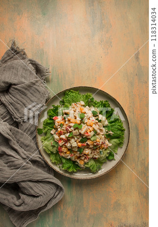 Canned corn salad, with crab sticks, top view, no people, Canned corn salad, with crab sticks, top view, no people, 118314034