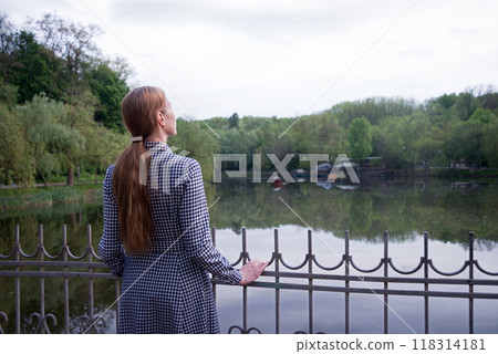 Sad girl praying to God 118314181